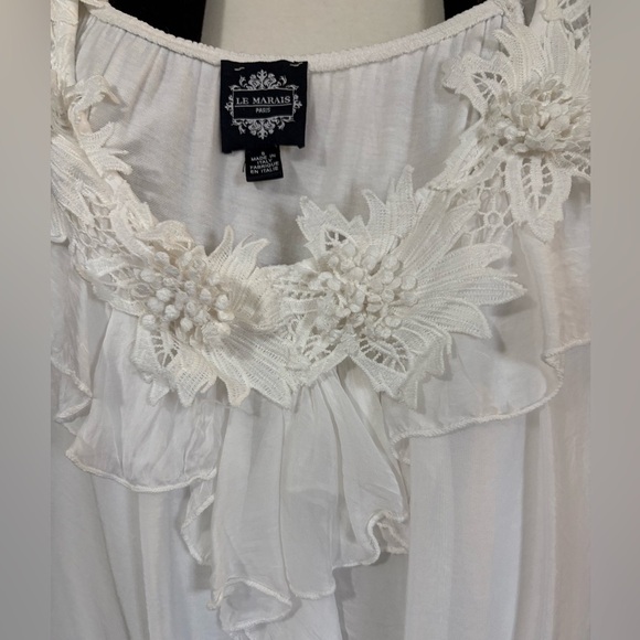 White silk made in Italy blouse. 3D flowers at v neckline. Ruffle front. - Picture 1 of 15
